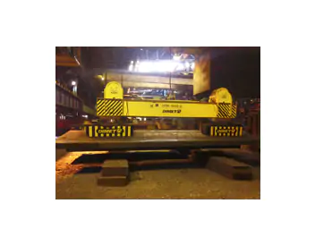 SPREADER BEAM FOR CAREFUL TURNING OF SLABS